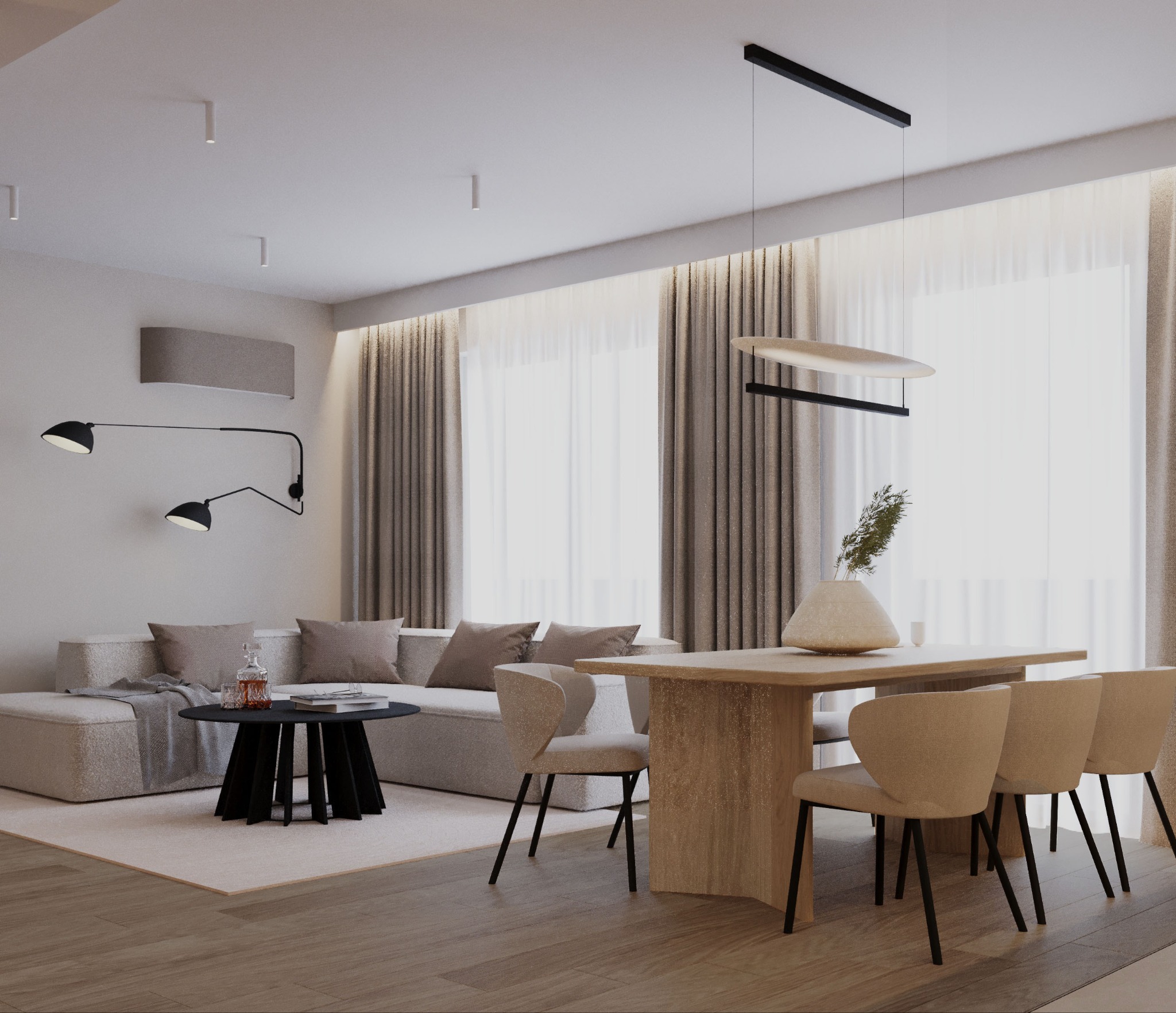 Jasne wnętrze: sofa z poduszkami, stół z krzesłami, dekoracje. Minimalistyczna lampa i czarny kinkiet dopełniają aranżację. Estetyczne i funkcjonalne rozwiązanie.