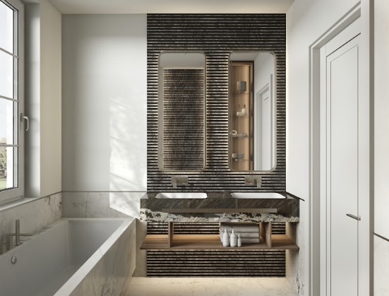 Nowoczesna łazienka z dwoma umywalkami na kamiennym blacie, duże lustra z zaokrąglonymi rogami, minimalistyczna wanna i białe drzwi. Widok z okna.