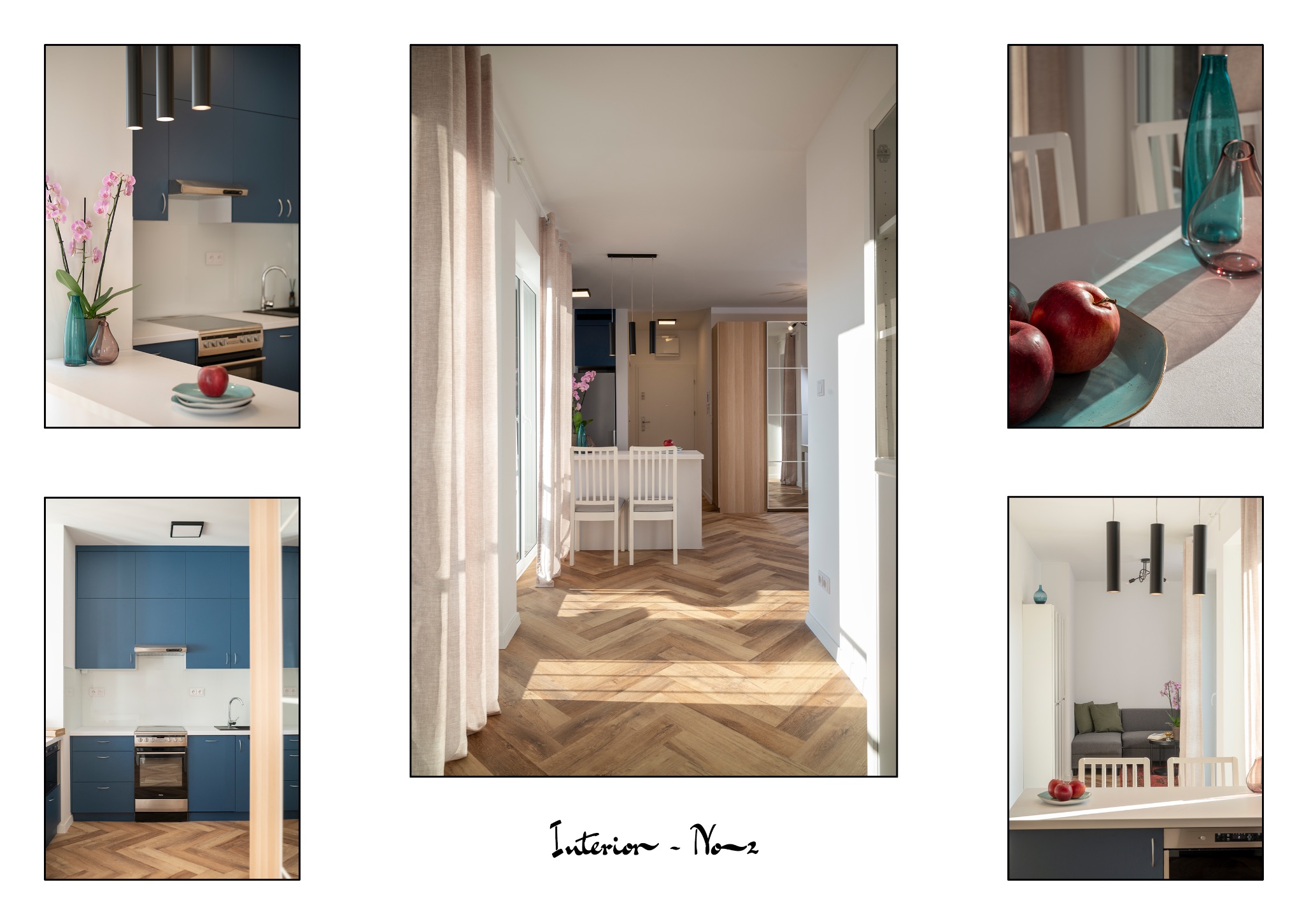 Jasne wnętrze mieszkania z parkietem w jodełkę, niebieską kuchnią i białymi ścianami. Widok na salon z kanapą. Na blacie jabłka i wazon z kwiatami.