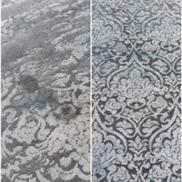 Dywan wzorzysty, szary, podzielony na dwie części: zabrudzoną i wyczyszczoną. Efekt prania dywanu, widoczny kontrast przed i po.