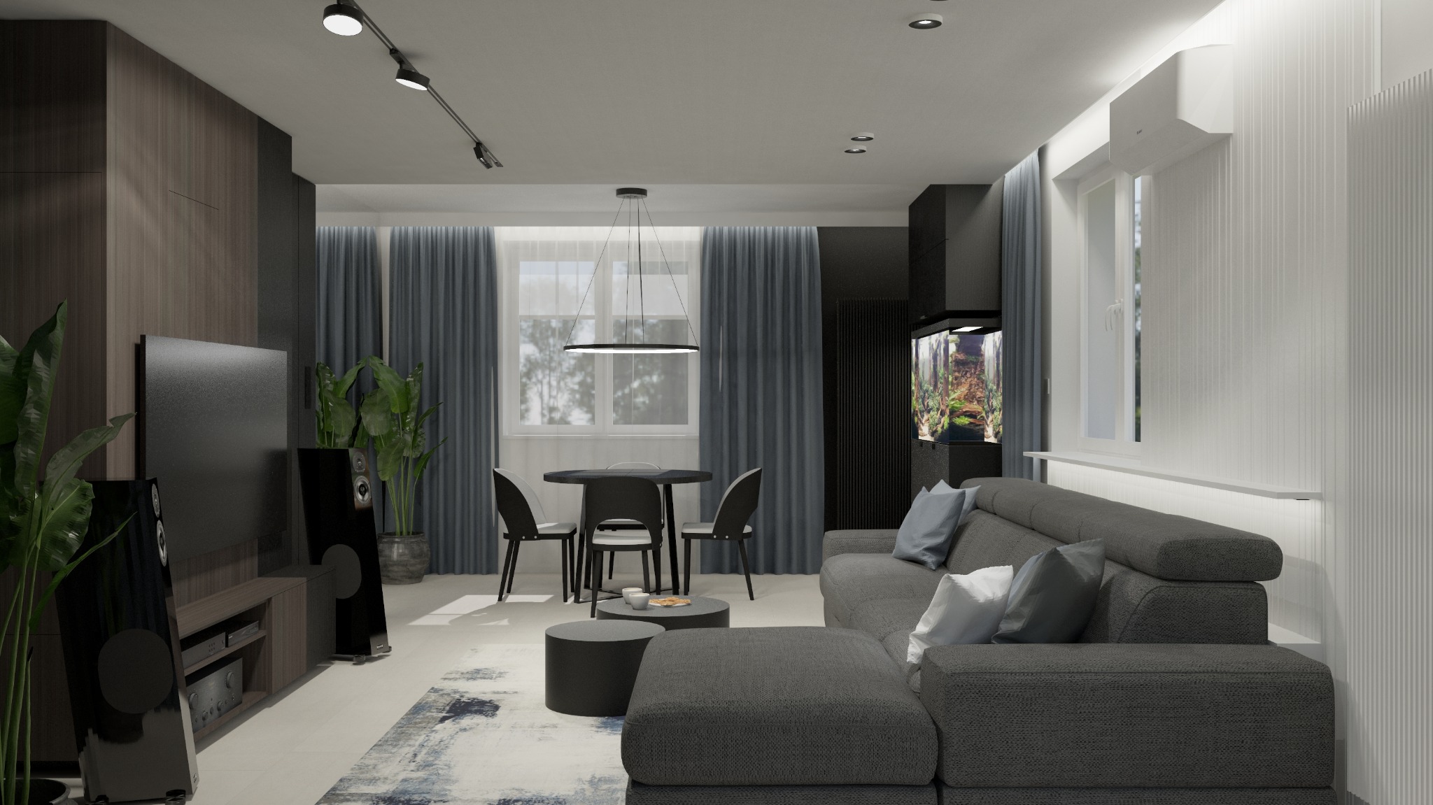 Nowoczesny salon z szarą sofą narożną, okrągłym stołem jadalnym i akwarium na ścianie. Minimalistyczne oświetlenie i rośliny doniczkowe dodają wnętrzu charakteru.