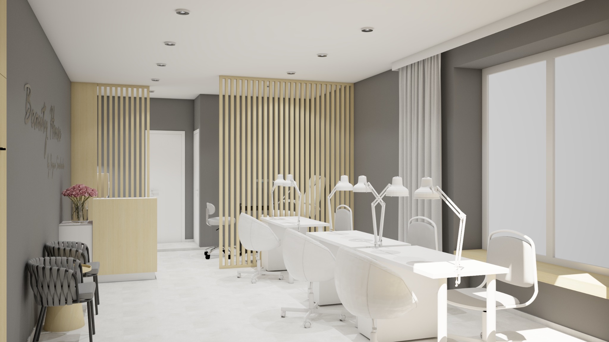 Jasne wnętrze salonu kosmetycznego: białe stanowiska do manicure z lampami, drewniane przepierzenia, szare ściany i duże okno z firaną. Minimalistyczny design.
