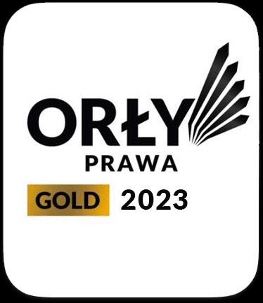 Logo 'Orły Prawa Gold 2023' na białym tle. Symbol przedstawia prestiżowe wyróżnienie w branży prawniczej. Czarno-złota kolorystyka i nowoczesny design.