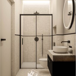 NEG DESIGN NATALIA GRZYWACZ - Nowoczesna łazienka z kabiną prysznicową w czarnej ramie, umywalką na blacie i okrągłym lustrem z podświetleniem LED. Stonowana kolorystyka, minimalistyczny design.