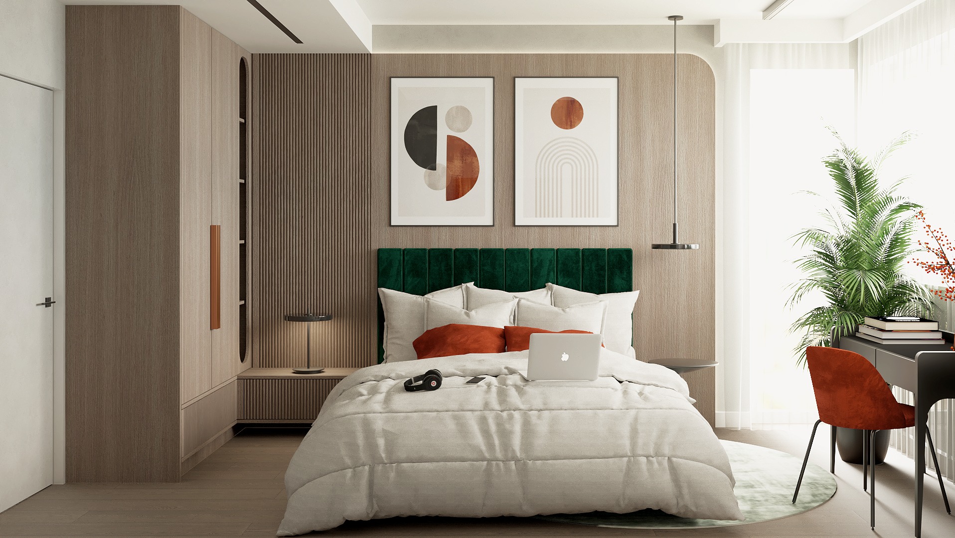 Jasna sypialnia z łóżkiem, zielonym zagłówkiem i drewnianą zabudową. Na łóżku laptop i słuchawki. Dwa abstrakcyjne obrazy nad łóżkiem. Minimalistyczny design.