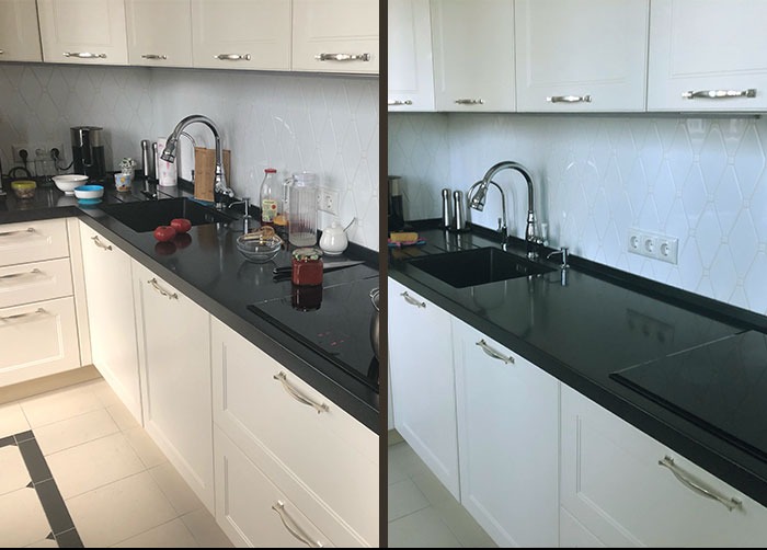 Kuchnia przed i po sprzątaniu: czarny blat z białymi szafkami, po lewej stronie widoczne naczynia i produkty, po prawej czysty blat i umyty zlew.