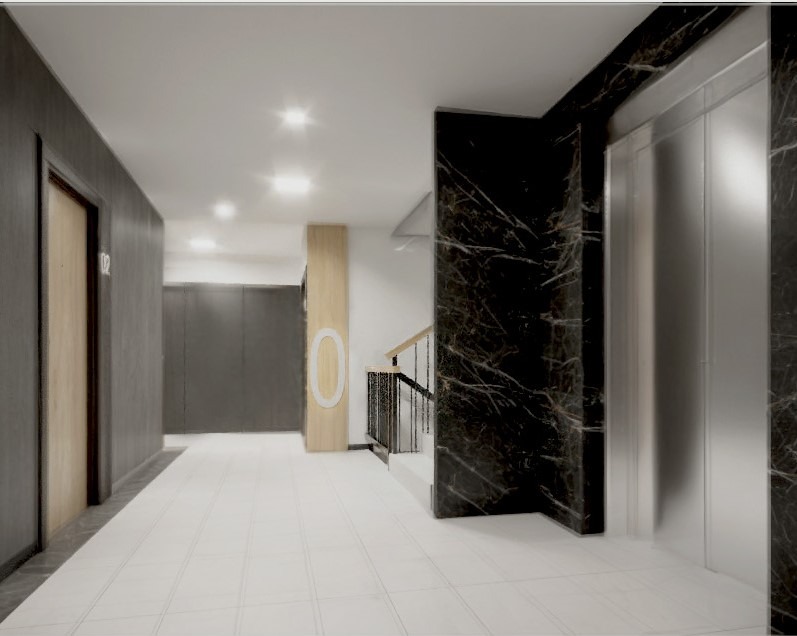 Nowoczesny korytarz z marmurowymi akcentami, oświetleniem sufitowym i minimalistycznymi drzwiami. Widoczny fragment schodów i windy.