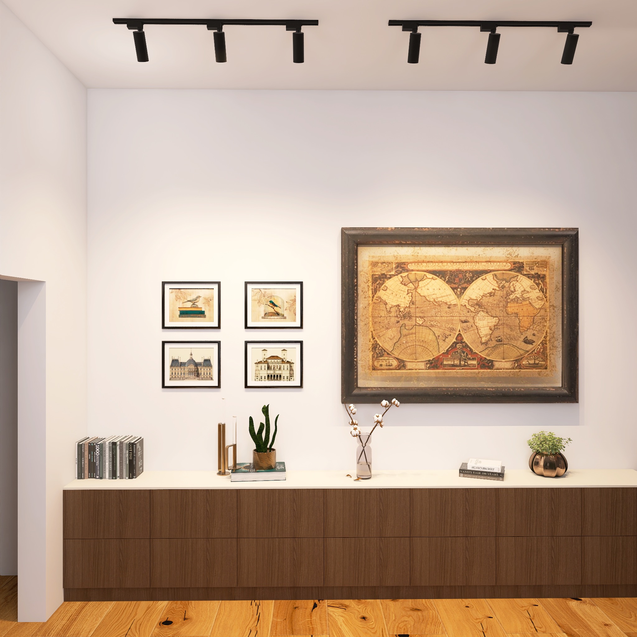 Salon z drewnianą komodą, mapą świata w ramie i galerią obrazków na ścianie. Oświetlenie szynowe podkreśla aranżację. Ciepłe odcienie drewna i bieli tworzą przytulną atmosferę.