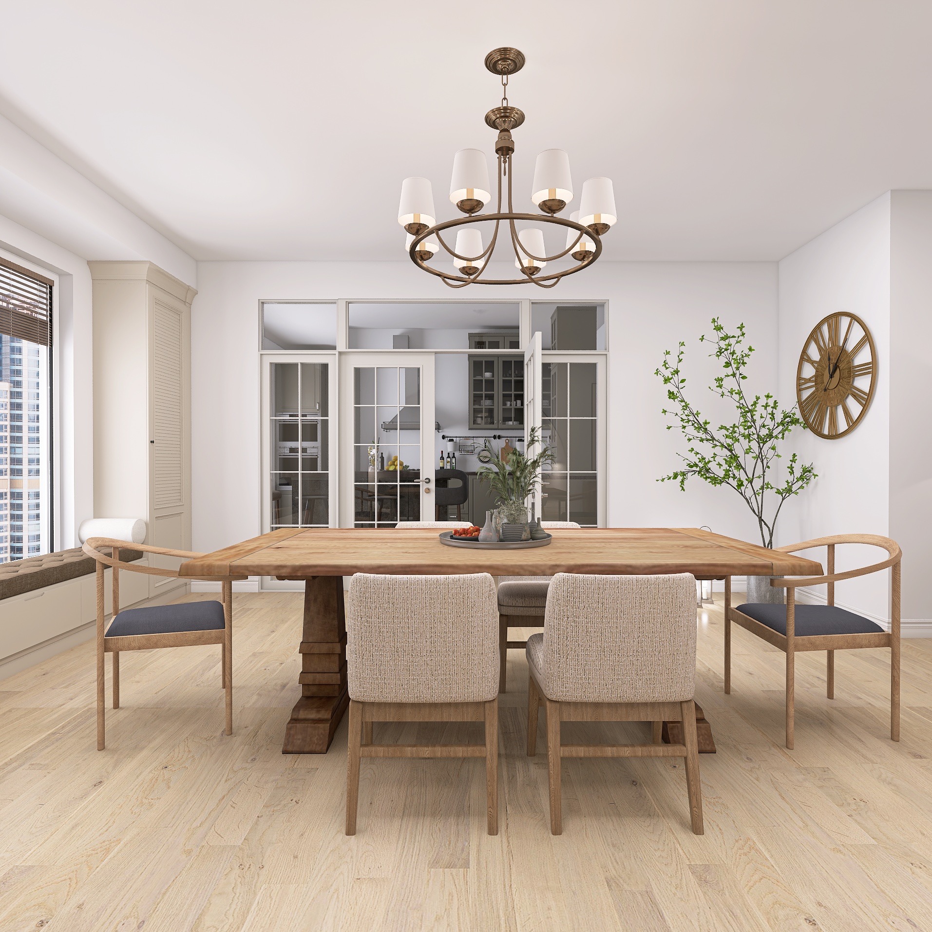 Jasna jadalnia z drewnianym stołem na masywnej nodze, krzesłami z szarą tapicerką i widokiem na kuchnię przez przeszklone drzwi. Całość oświetla dekoracyjny żyrandol.