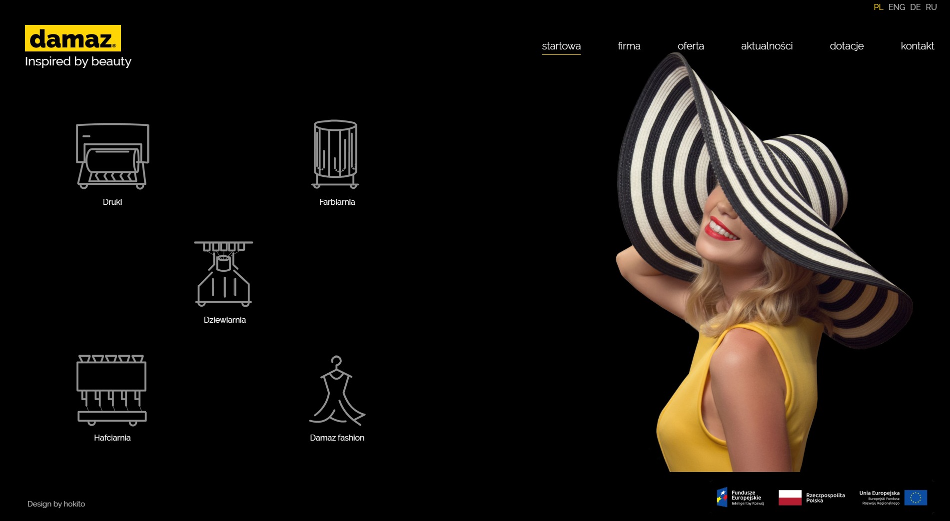 Strona internetowa firmy Damaz z ikonami usług (druki, farbiarnia, dziewiarnia, hafciarnia, Damaz fashion) i uśmiechniętą kobietą w kapeluszu.