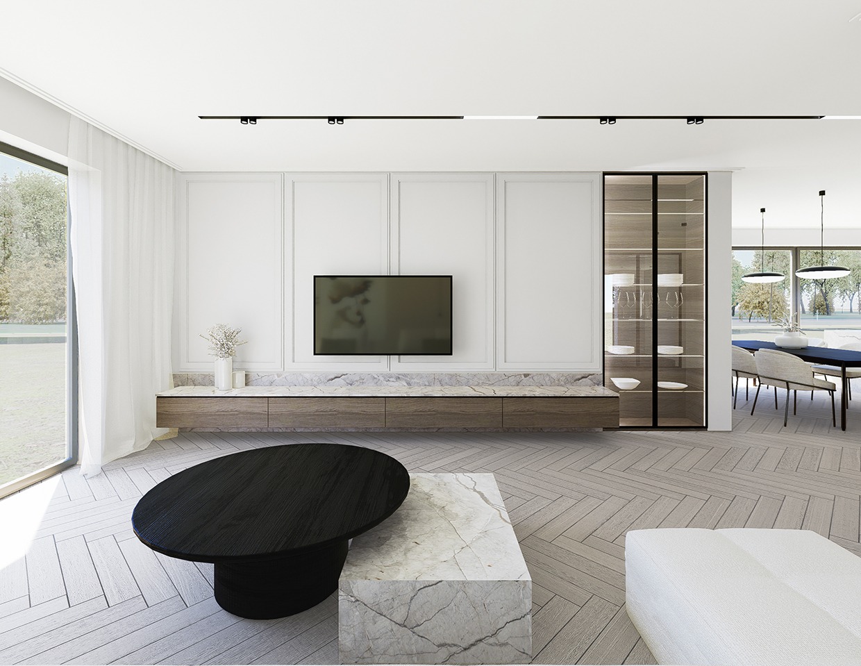 Jasne wnętrze salonu z telewizorem na ścianie, marmurową komodą i stolikiem kawowym. Widok na jadalnię przez otwarte przejście. Minimalistyczny design z przewagą bieli i szarości.