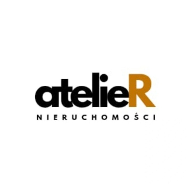 Logo agencji nieruchomości AtelierR z czarnym napisem 'atelier' i pomarańczowym 'R' na białym tle. Pod spodem napis 'NIERUCHOMOŚCI'.