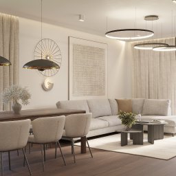 CM Studio - Jasne wnętrze w Toruniu: stół z krzesłami, sofa, okrągłe lampy sufitowe i dekoracje ścienne. Minimalistyczny design z akcentami natury i ciepłym oświetleniem.