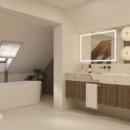 CM Studio - Jasna łazienka na poddaszu z wanną wolnostojącą i podwójną umywalką z marmurowym blatem, oświetlona lustrami LED i lampami kulistymi.