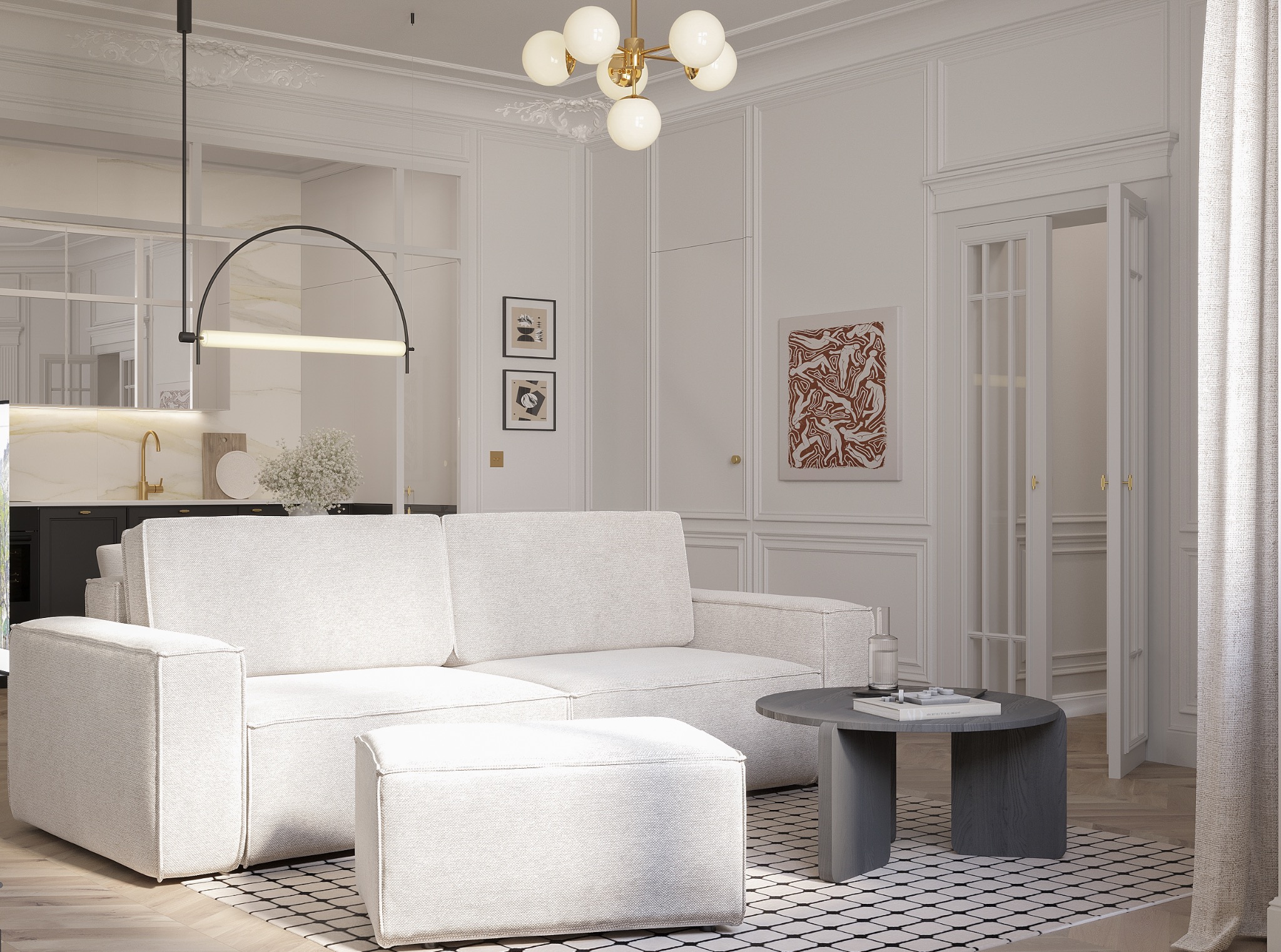 Jasny salon z sofą modułową, okrągłym stolikiem i wzorzystym dywanem. W tle widoczna kuchnia z czarnymi szafkami i marmurowym blatem. Całość w neutralnej palecie barw.