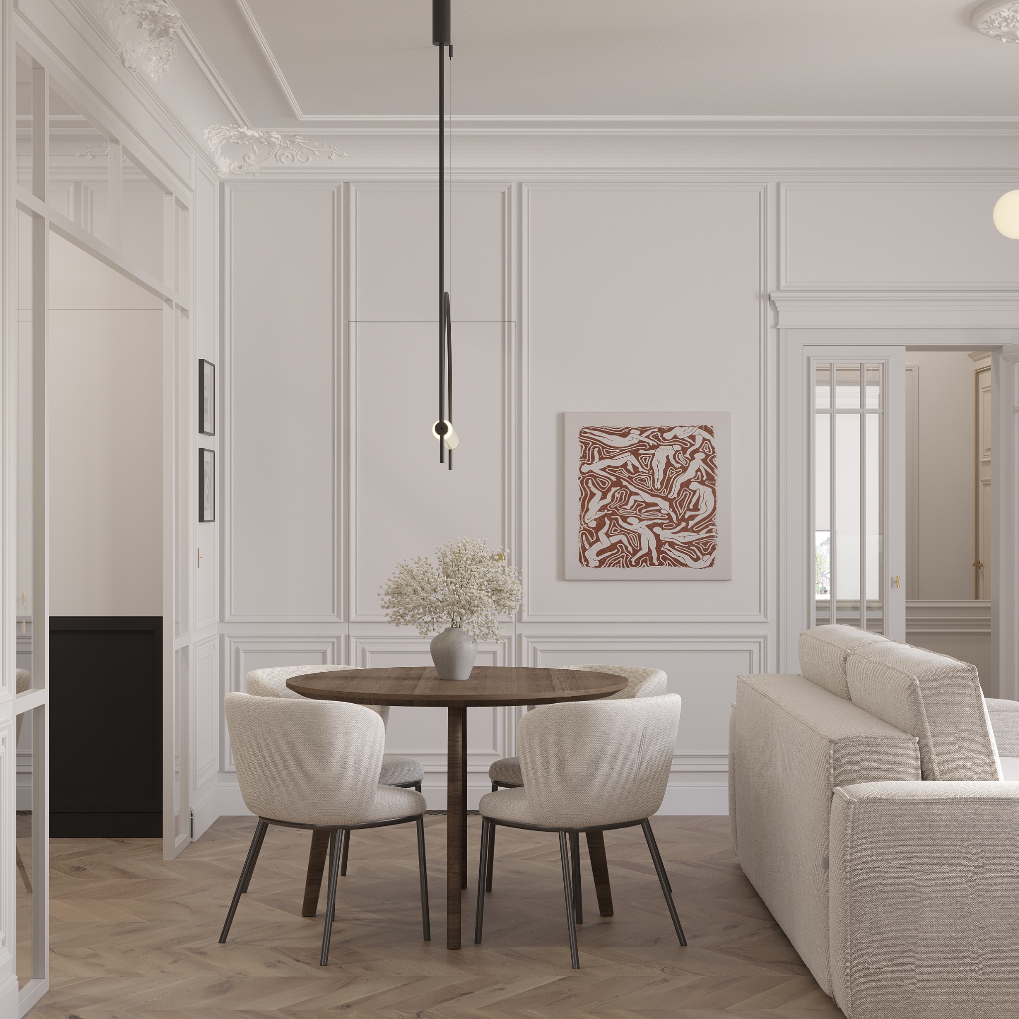 Elegancka jadalnia w stylu klasycznym: okrągły drewniany stół, krzesła tapicerowane w odcieniach beżu, parkiet w jodełkę i dekoracyjne sztukaterie na ścianach.