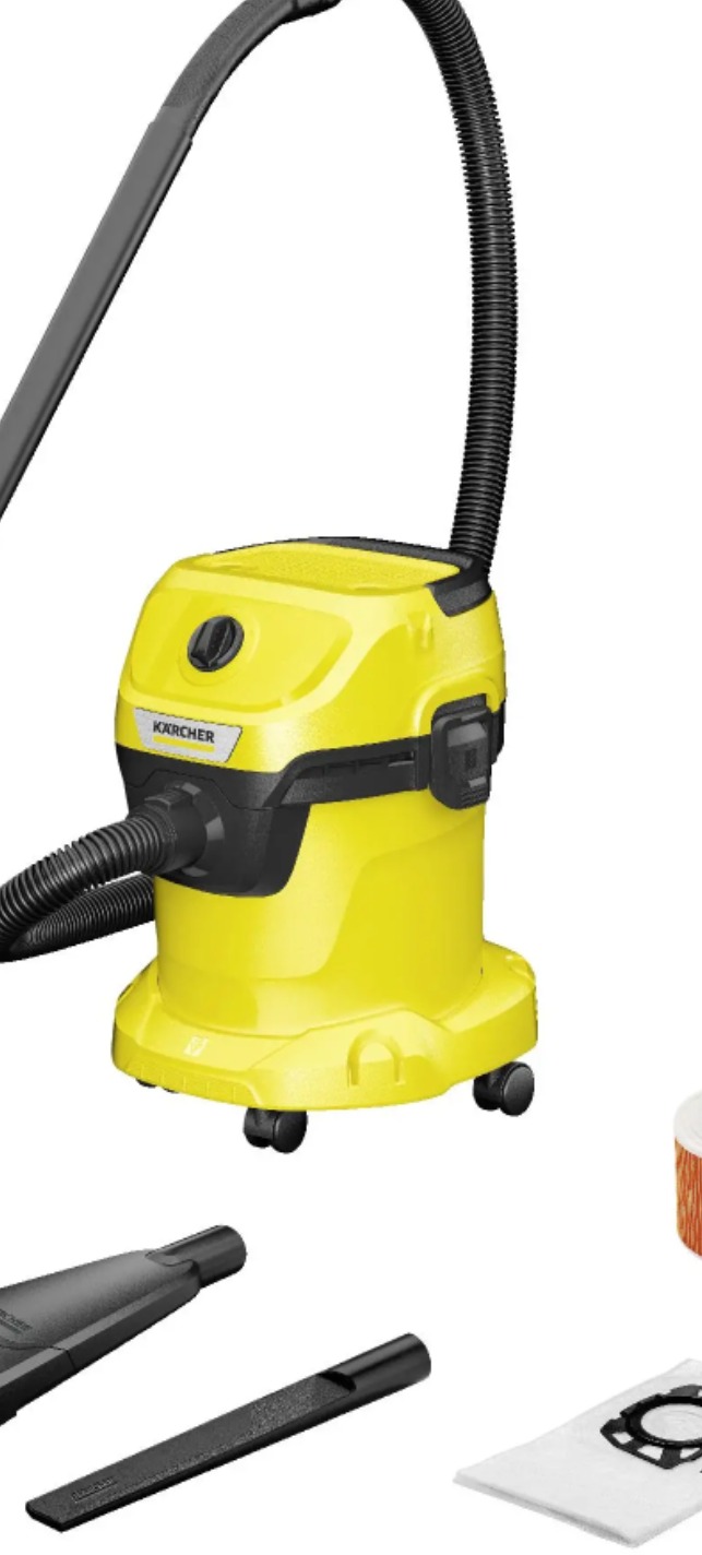 Żółty odkurzacz piorący Karcher z akcesoriami: ssawką szczelinową, workiem i filtrem, na białym tle. Urządzenie do czyszczenia tapicerki i dywanów.