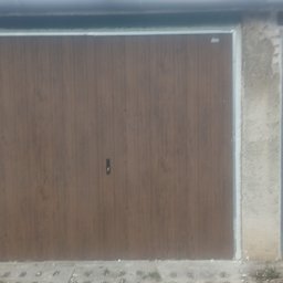 Poszerzenie swiatla wiazdu do garażu oraz montaż nowej większej bramy wjazdowej 