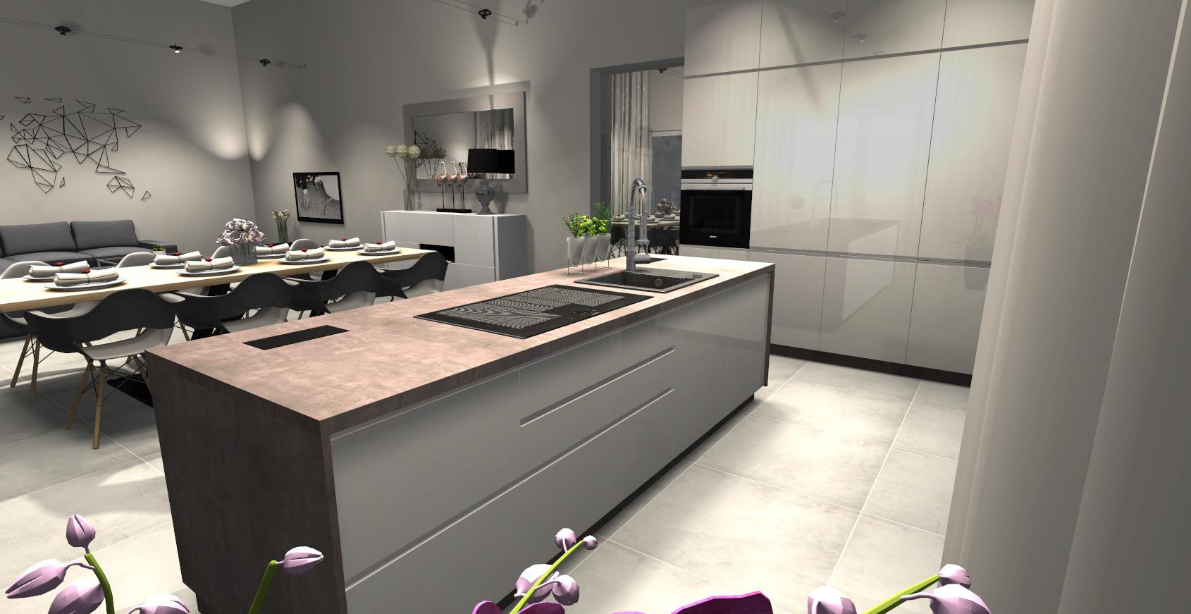 Nowoczesna kuchnia z wyspą i płytą indukcyjną, jadalnia z długim stołem. Minimalistyczny design, stonowana kolorystyka, kwiaty w wazonie dodają akcentu.