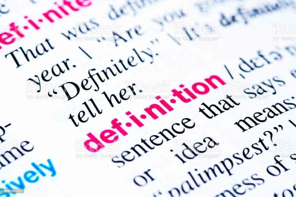 Słowo 'definition' wyróżnione na czerwono w słowniku, otoczone innymi słowami i definicjami, tworząc kompozycję edukacyjną.