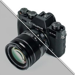 Grafmaga - Czarny aparat Fujifilm X-T10 z obiektywem 18-55mm na dwukolorowym tle. Widoczne pokrętła ustawień i oznaczenia modelu. Ostrość na obiektywie.