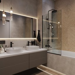 DZ Interiors - Nowoczesna łazienka z dwoma umywalkami, podświetlanym lustrem i kabiną prysznicową typu walk-in. Uwagę zwracają drewniane panele na ścianie i designerskie lampy.