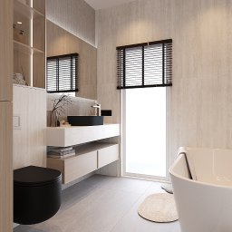 DZ Interiors - Nowoczesna łazienka z beżowymi płytkami, czarną umywalką i toaletą. Minimalistyczne szafki pod umywalką, okno z drewnianymi żaluzjami i wolnostojąca wanna.