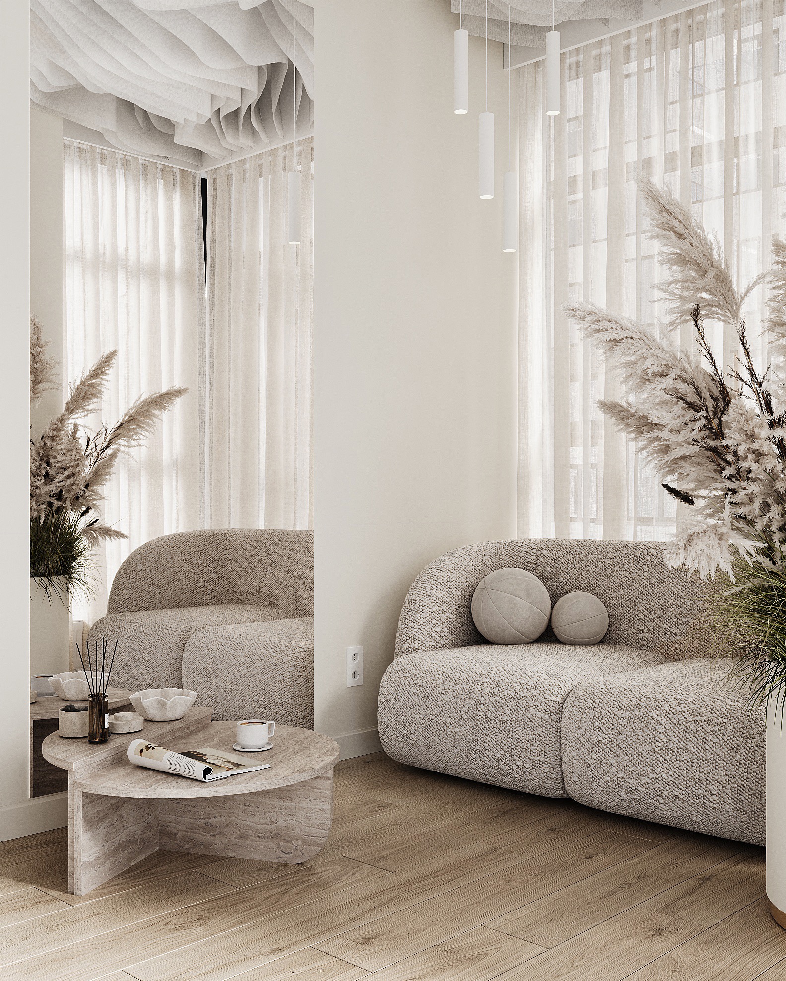 Stylowy salon z teksturowaną sofą, okrągłym stolikiem kawowym i wysoką trawą pampasową. Minimalistyczne lampy wiszące i jasne zasłony dopełniają aranżację.