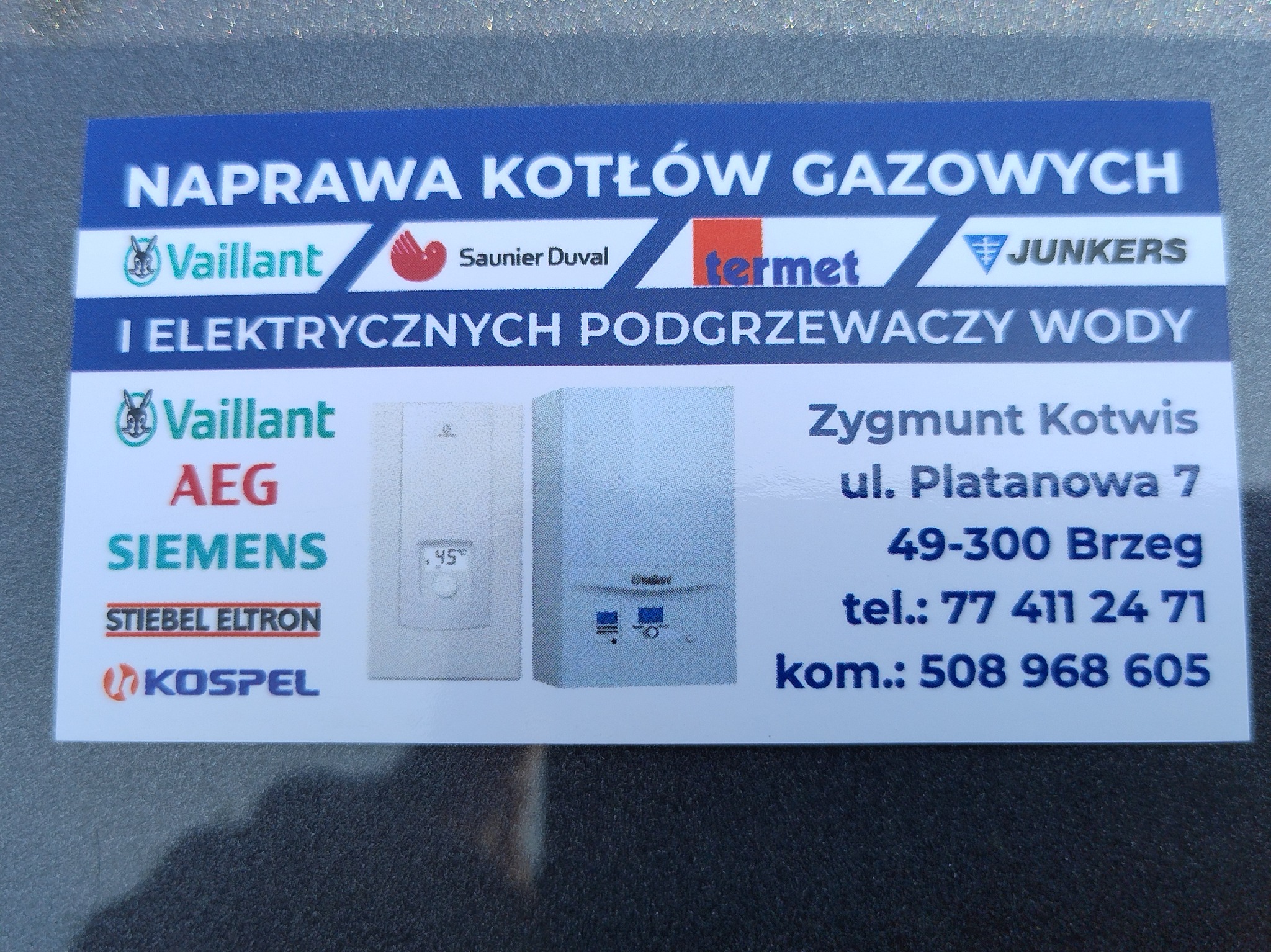 Wizytówka firmy Zygmunta Kotwisa z Brzegu, specjalizującej się w naprawie kotłów gazowych i elektrycznych podgrzewaczy wody, z logo Vaillant, Termet i Junkers.