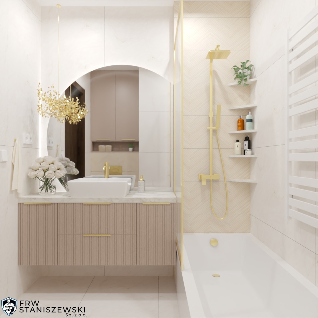 Elegancka łazienka w beżach i bieli z akcentami złota: umywalka nablatowa, bateria, kabina prysznicowa. Uwagę przykuwa lustro w kształcie łuku i dekoracyjny żyrandol.