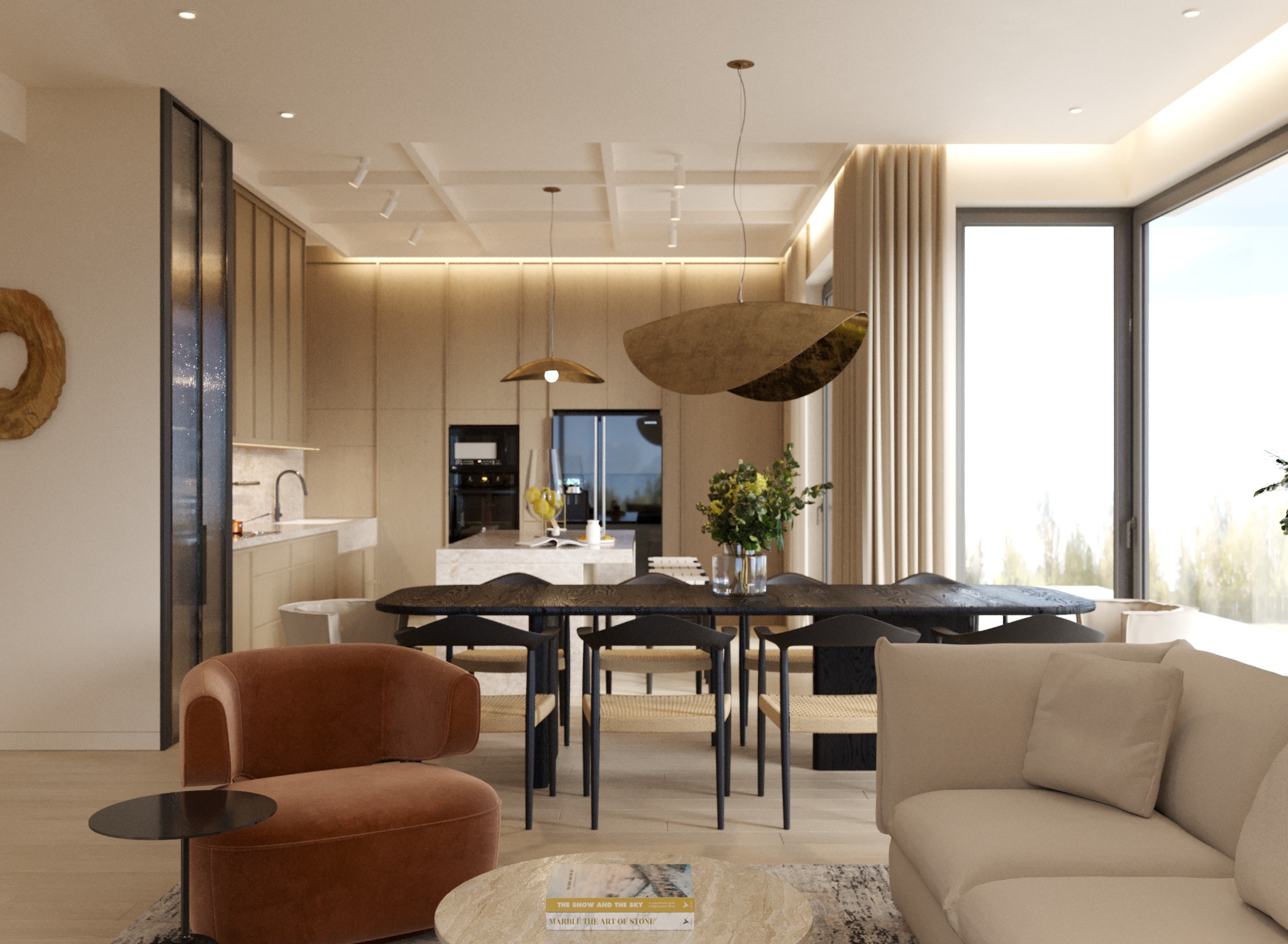 Beżowe wnętrze z jadalnią i aneksem kuchennym. Krzesła z jasną plecionką, drewniany stół, brązowy fotel i elementy dekoracyjne.