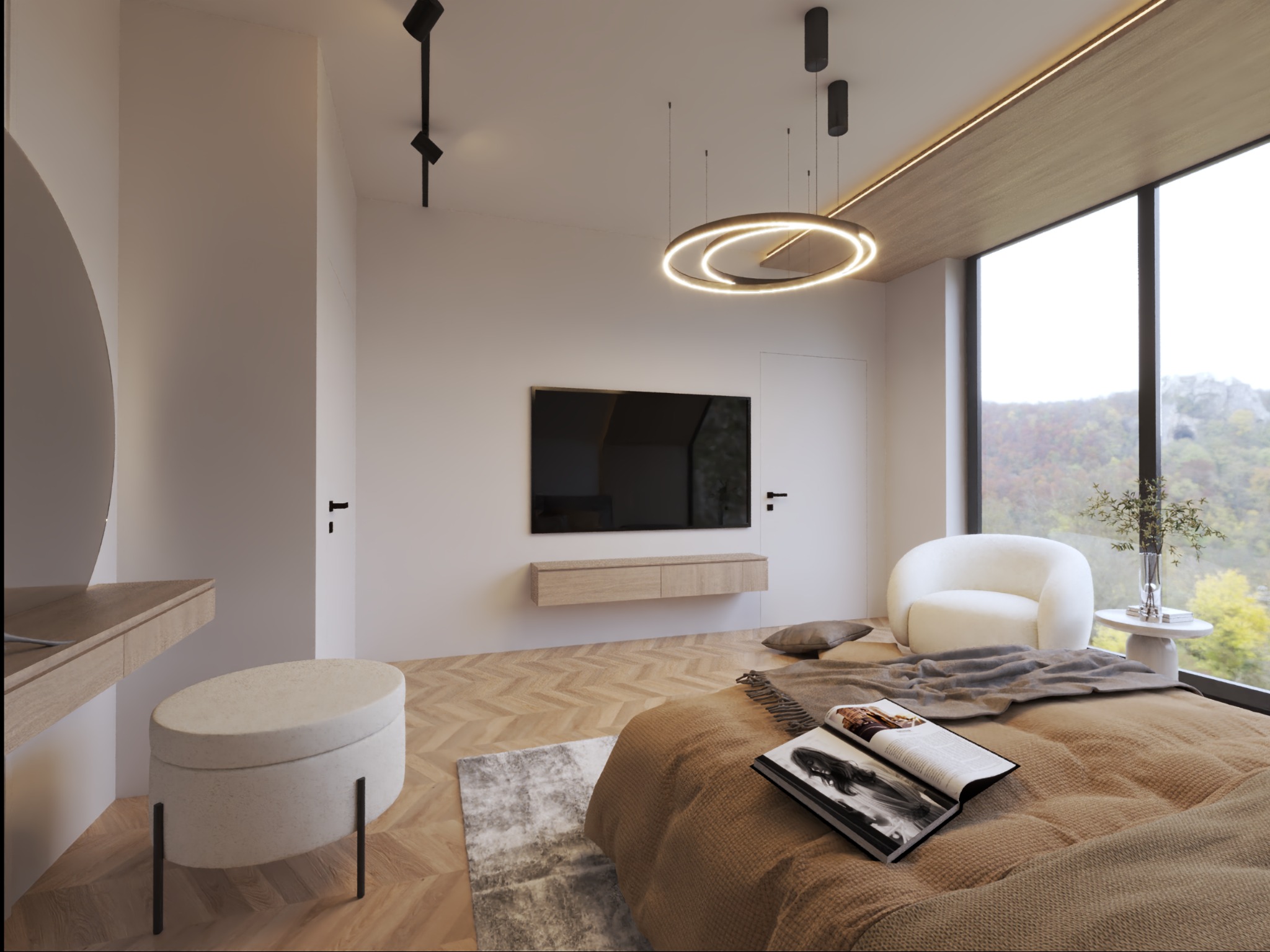 Jasna sypialnia z dużym oknem i widokiem na zieleń. Okrągła lampa sufitowa, telewizor na ścianie, toaletka z lustrem i pufą, fotel i stolik. Na łóżku leży otwarta książka.