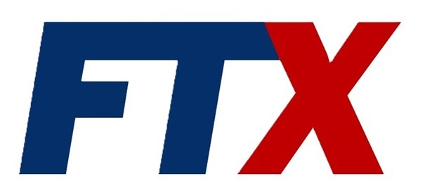 Grafika z logo FTX: niebieskie 'FT' i czerwone 'X' na białym tle. Logo jest proste, geometryczne i łatwo rozpoznawalne. Kolory są intensywne i kontrastowe.