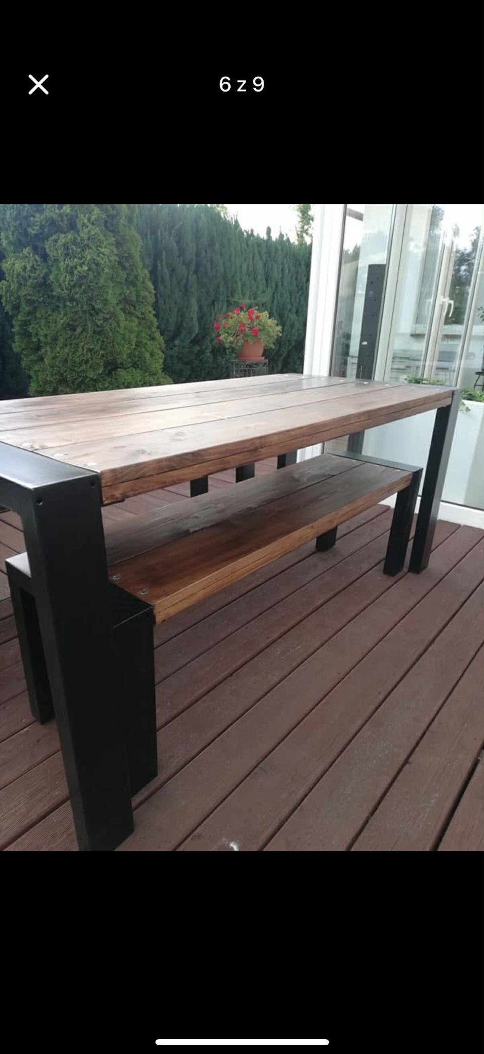 Stół ogrodowy z ławką z drewna i metalu, wykonany na zamówienie w Strzelcach Krajeńskich. Solidna konstrukcja, naturalne materiały, nowoczesny design.