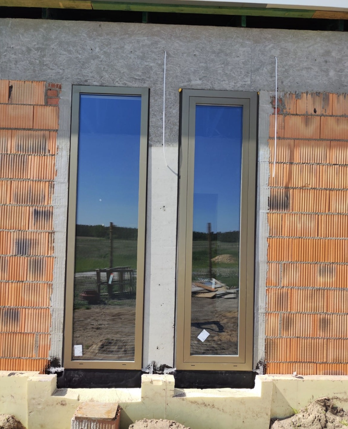 Realizacja - okna aluminiowe - ANODA C32 kolor szampan