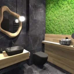Nowoczesna łazienka z czarnymi marmurowymi płytkami, umywalką na drewnianym blacie, toaletą w kolorze antracytu i ścianą pokrytą mchem.