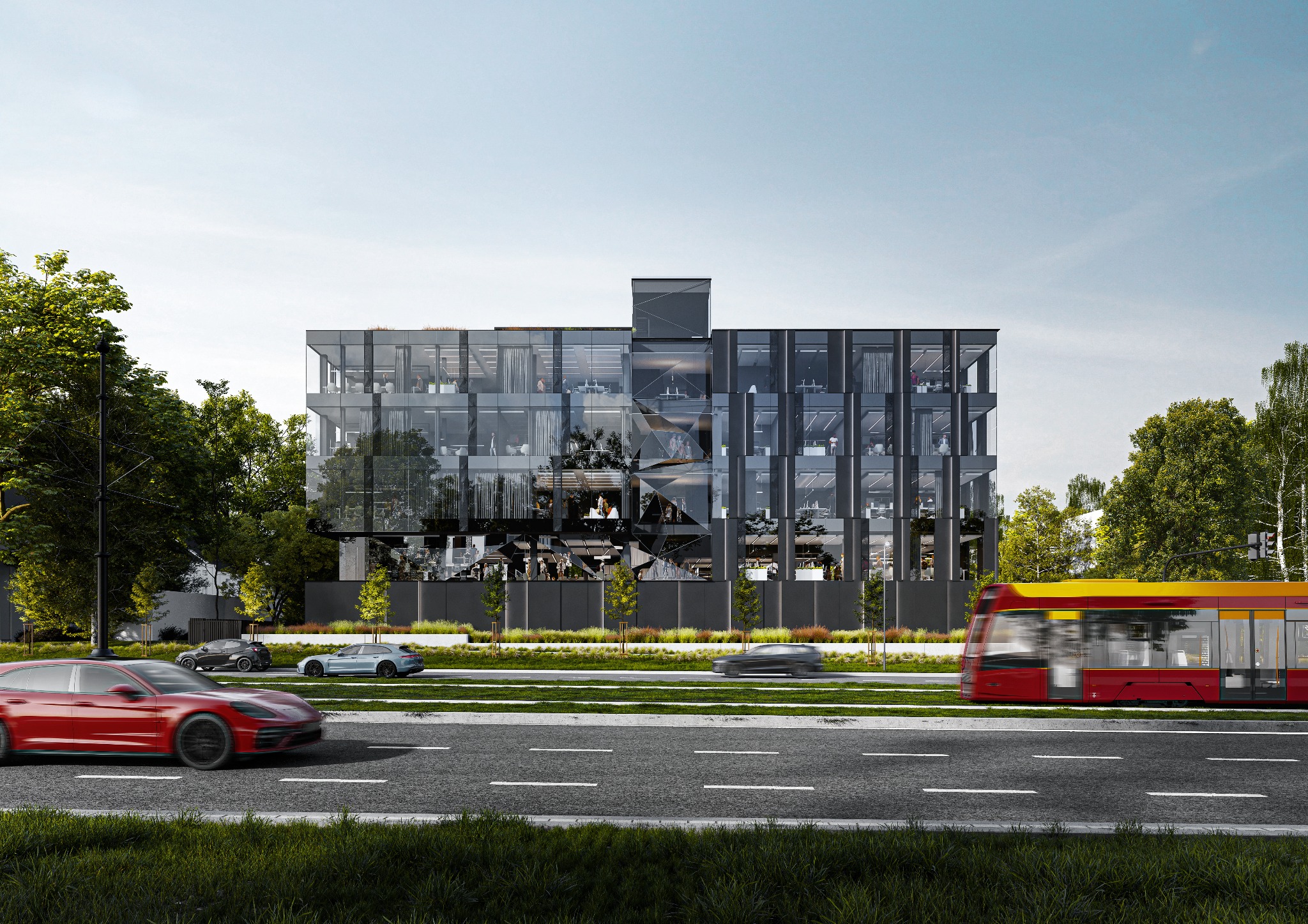 Nowoczesny budynek biurowy z przeszkloną fasadą, otoczony zielenią i ulicą z tramwajem, prezentujący projekt architektoniczny z dbałością o detale i otoczenie.