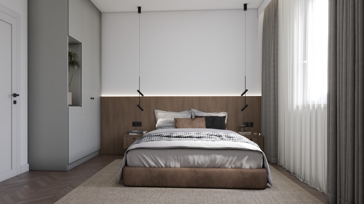 Nowoczesna sypialnia z łóżkiem na tle drewnianej ściany z oświetleniem LED, szarą szafą z wnęką na roślinę i zasłonami przy oknie.