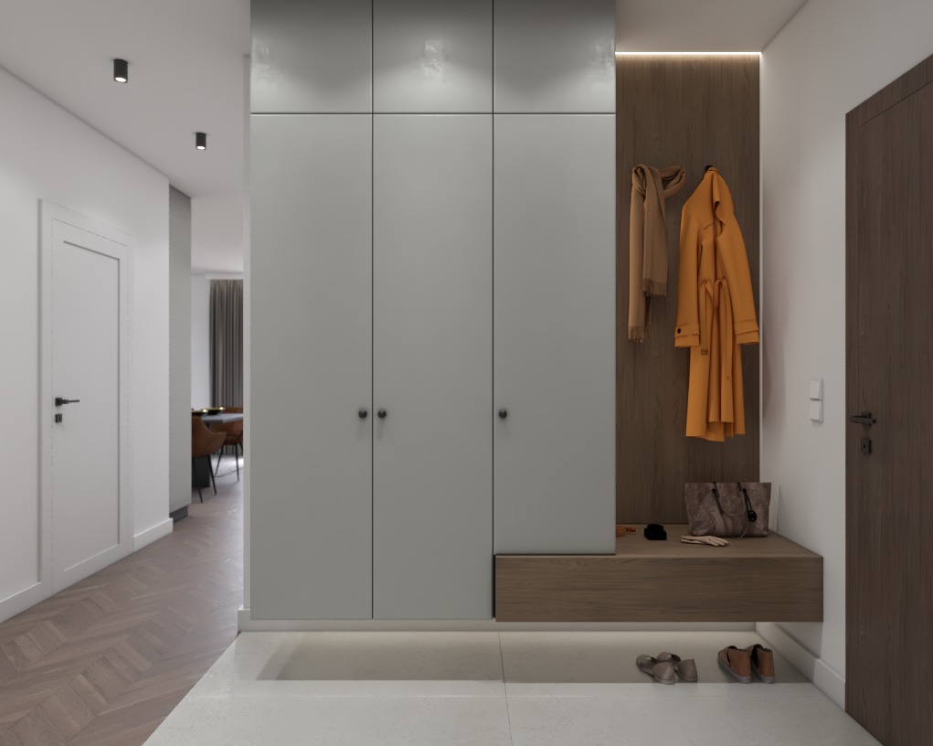 Nowoczesna szafa wnękowa z siedziskiem i wieszakami na ubrania w jasnym przedpokoju. Minimalistyczny design, oświetlenie LED pod szafą, eleganckie wykończenie.