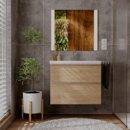 Vladyslav Nesterenko VNEST Visual & Architectural Studio - Nowoczesna łazienka z drewnianą szafką pod umywalką, lustrem z podświetleniem i zieloną ścianą odbijającą się w lustrze. Szare płytki i drewniana podłoga.