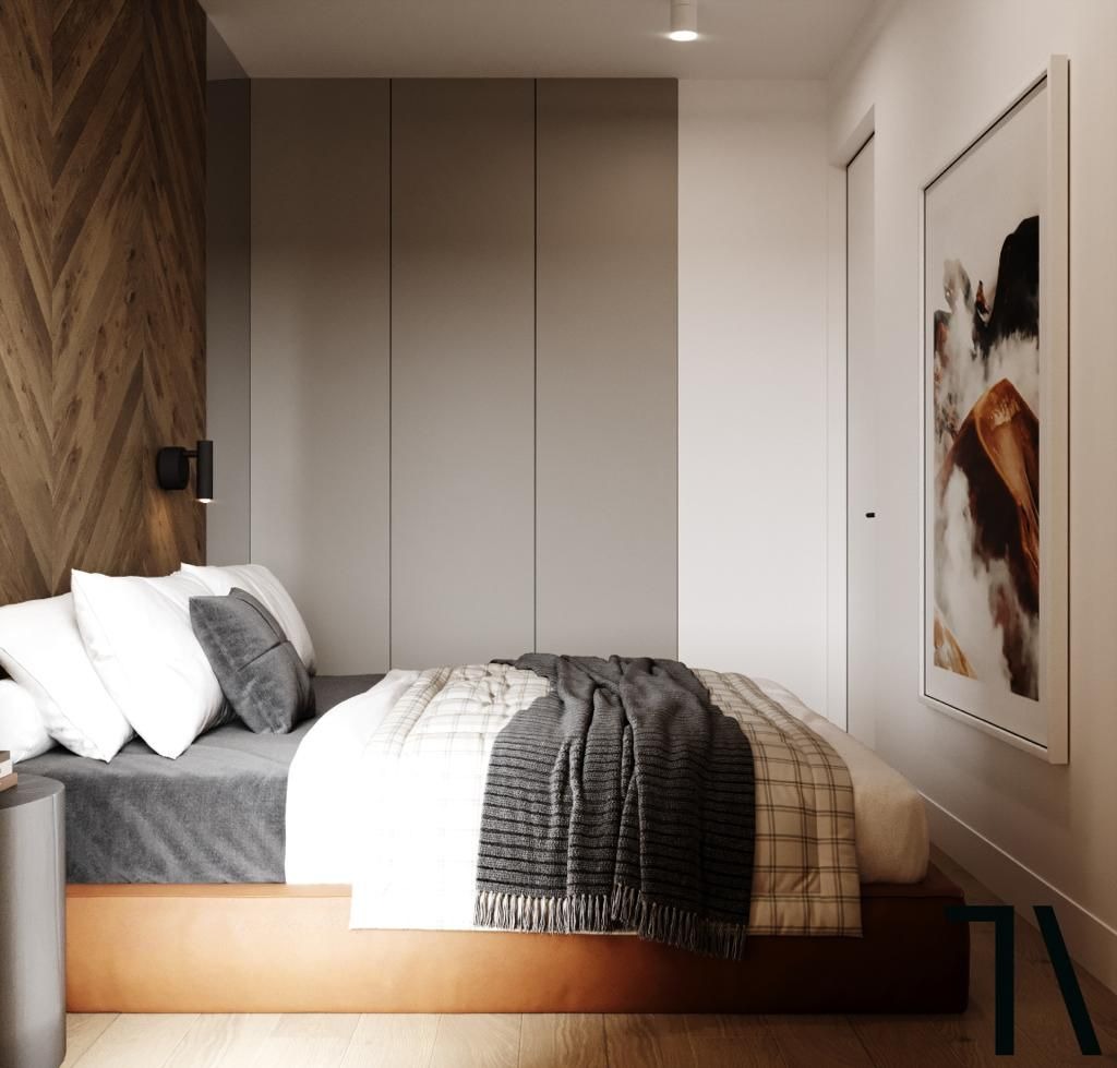 Nowoczesna sypialnia z drewnianą ścianą w jodełkę, szarą pościelą i minimalistycznym oświetleniem. Obraz w ramie dodaje charakteru wnętrzu.