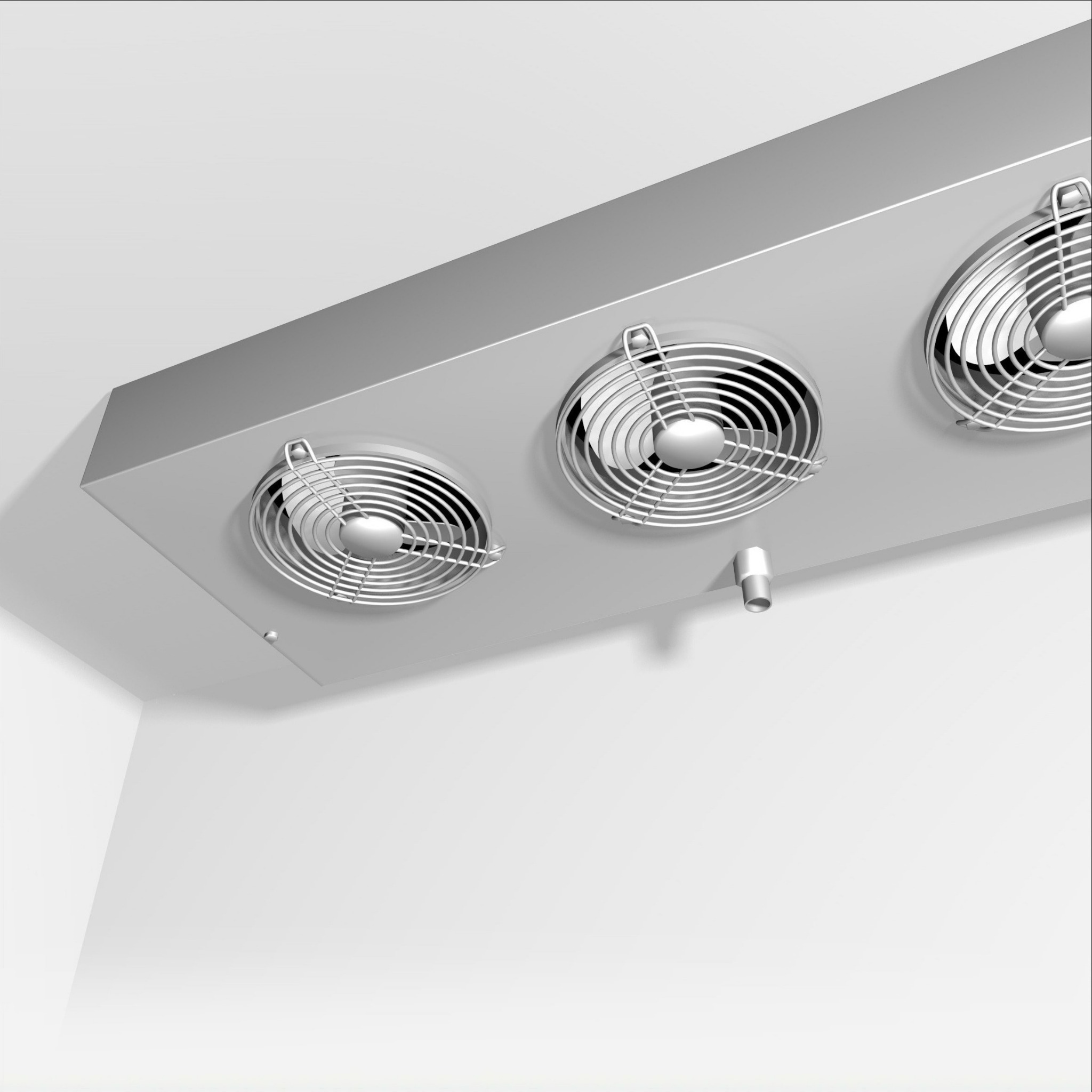 Sufitowa chłodnica przemysłowa z trzema wentylatorami w metalowej obudowie, zamontowana w rogu pomieszczenia z białymi ścianami. Widok z dołu, kątowe ujęcie.