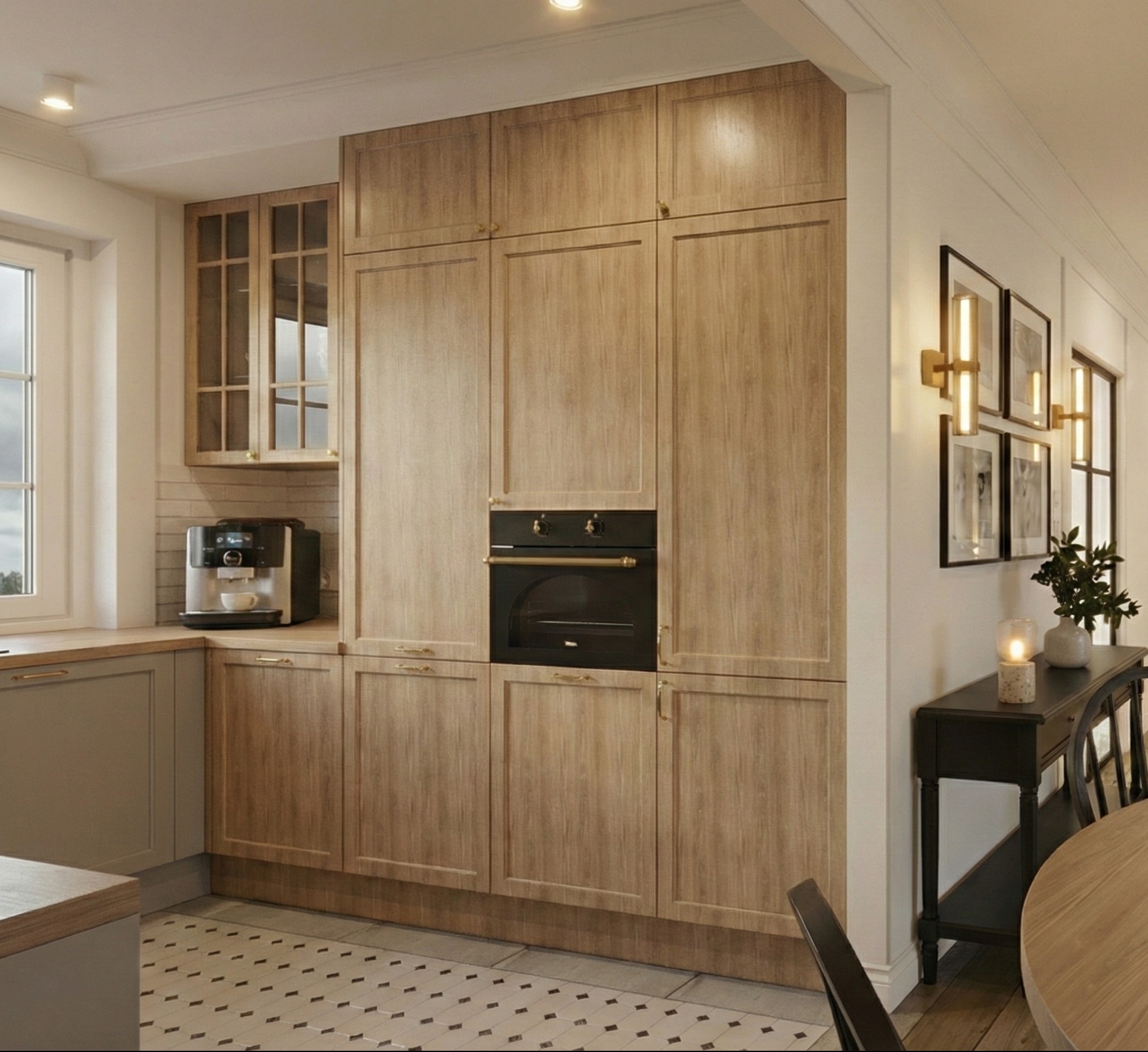 Jasna kuchnia z drewnianymi szafkami, wbudowanym piekarnikiem i ekspres do kawy przy oknie. Uzupełniona o czarną konsolę i dekoracje.