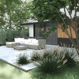 Nowoczesny taras z rattanowym narożnikiem, stolikiem kawowym i ozdobnymi trawami, idealny do relaksu w ogrodzie. Minimalistyczny design.