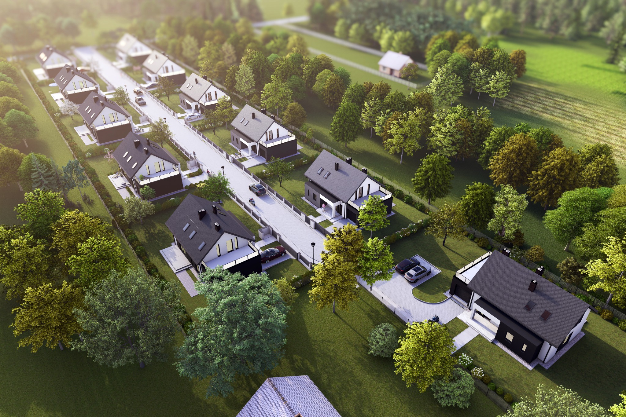 Osiedle nowoczesnych domów jednorodzinnych z czarnymi dachami, widziane z lotu ptaka, z wyraźnie zaznaczonymi podjazdami i ogrodami.