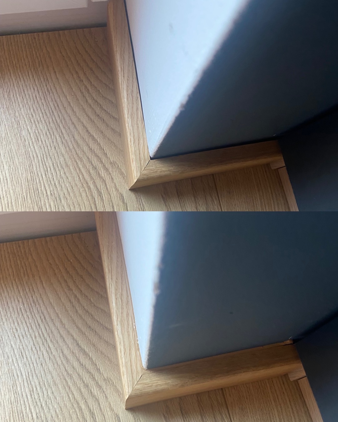 Szczegółowe ujęcie połączenia drewnianej podłogi z listwą przypodłogową i ścianą w odcieniach szarości. Widoczne precyzyjne wykończenie i naturalna tekstura drewna.