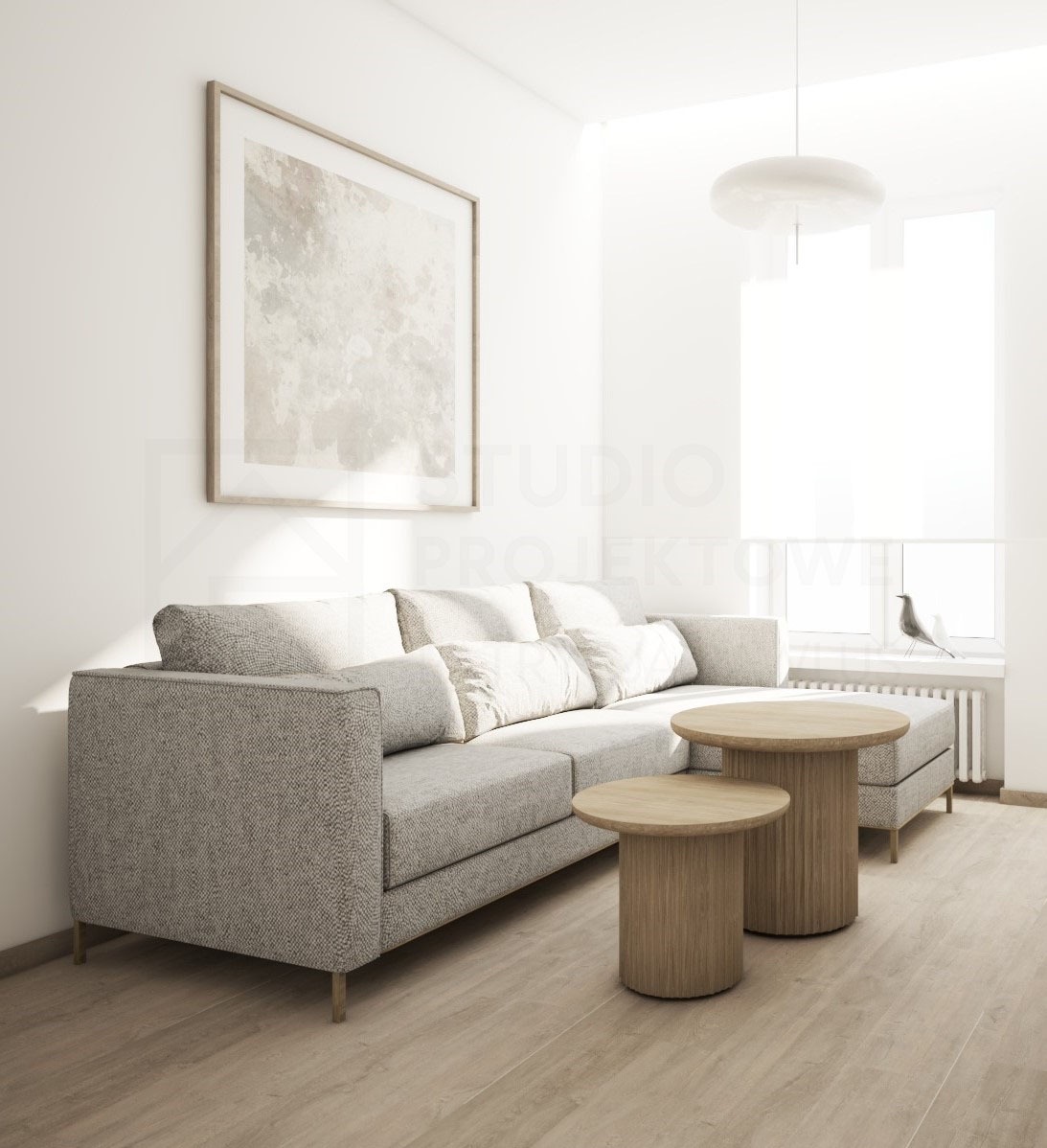 Jasne wnętrze: szara sofa z poduszkami, okrągłe stoliki kawowe z drewna, obraz na ścianie i dekoracja okna z figurką ptaka. Minimalistyczny design.