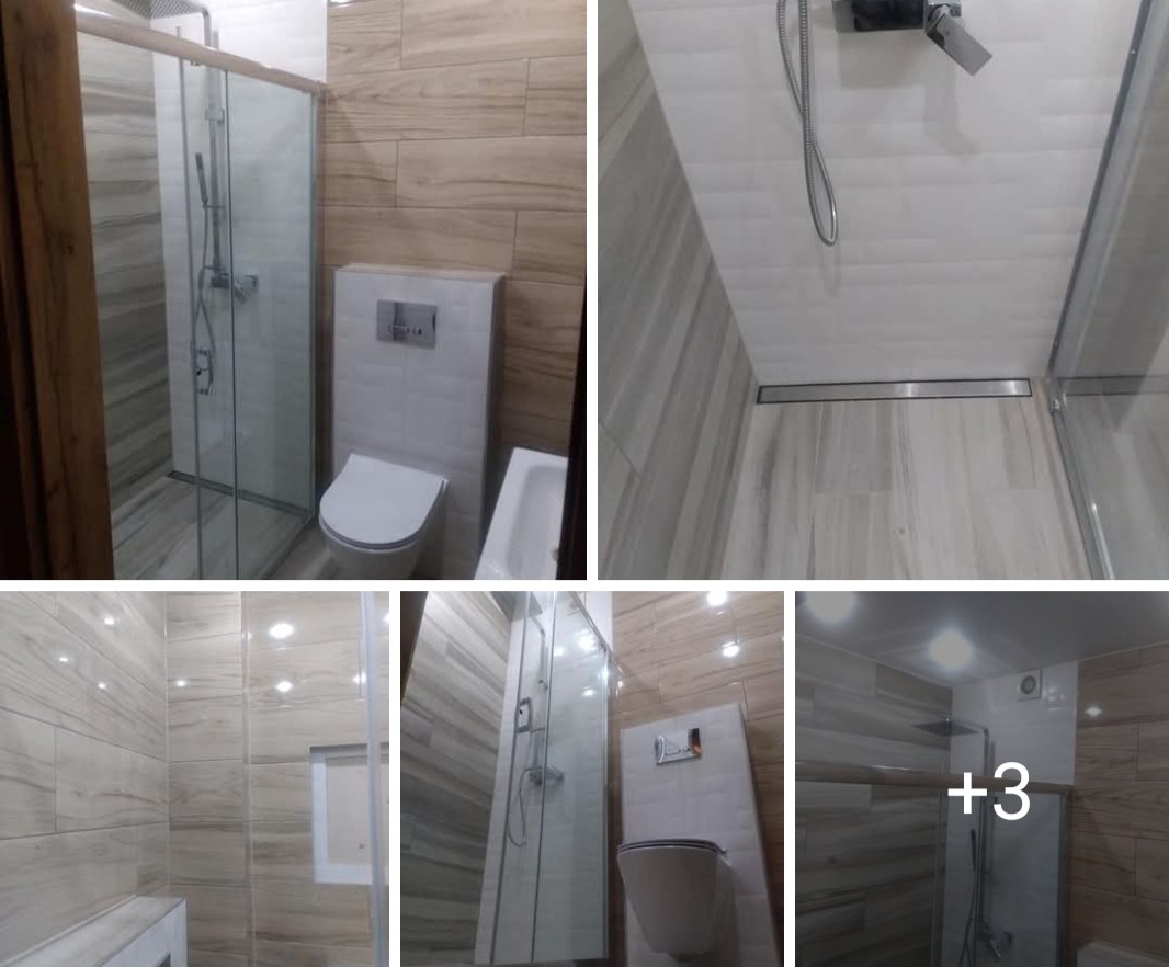 Nowoczesna łazienka z kabiną prysznicową typu walk-in, podwieszaną toaletą i płytkami imitującymi drewno. Widoczny odpływ liniowy i minimalistyczna armatura.