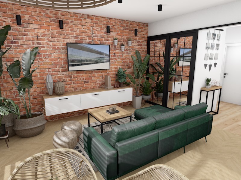 Salon z ceglaną ścianą i zieloną sofą w Sandomierzu. Nowoczesny wystrój z roślinami, białymi szafkami i drewnianym stolikiem kawowym.
