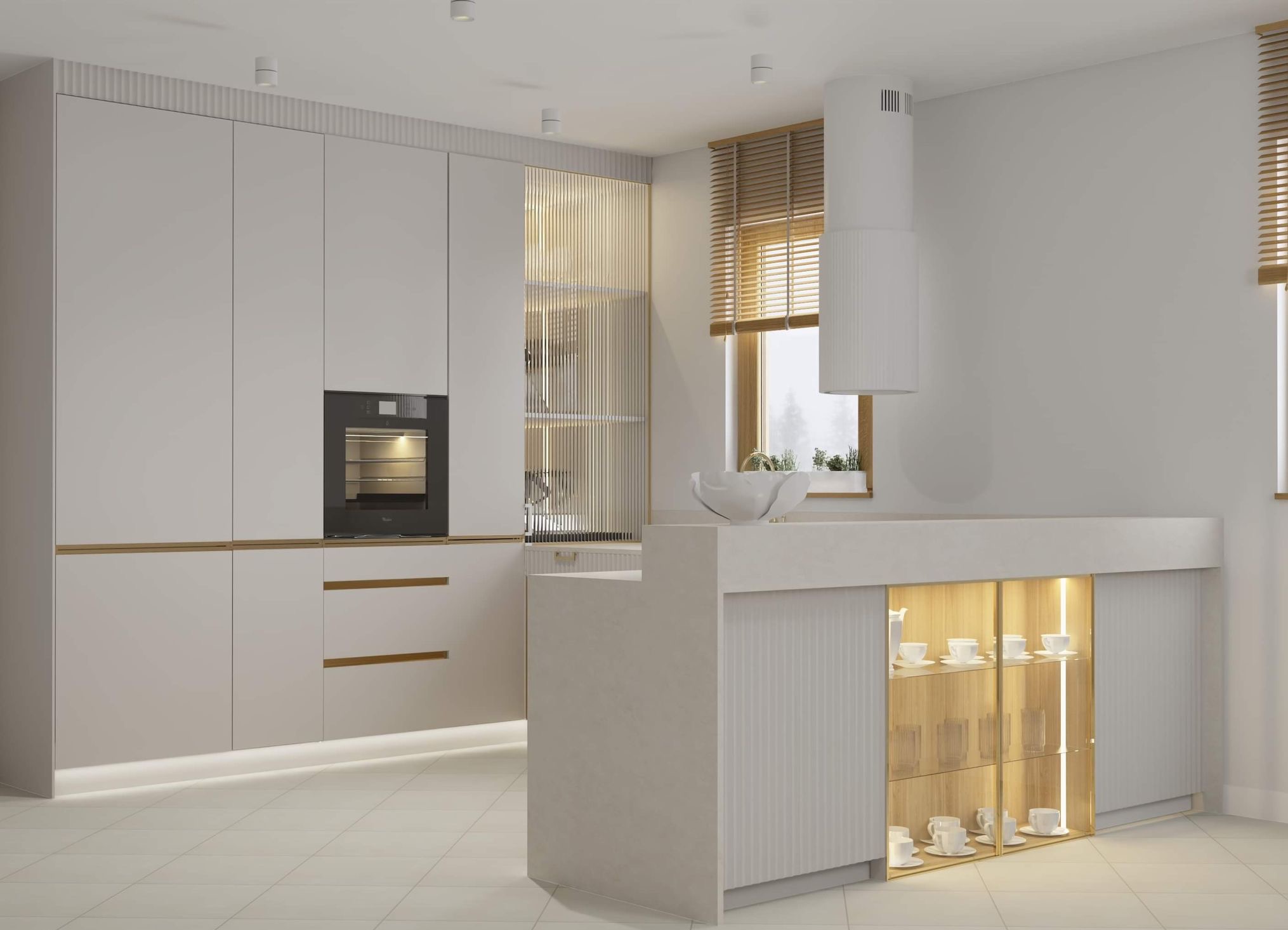 Jasna kuchnia na wymiar z wyspą i oświetleniem LED. Fronty szafek gładkie, matowe. Na wyspie ekspozycja zastawy stołowej. Minimalistyczny design.